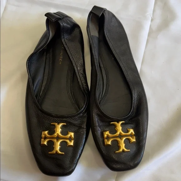 Tory Burch Black Flats with Gold Emblem - Picture 2 of 5